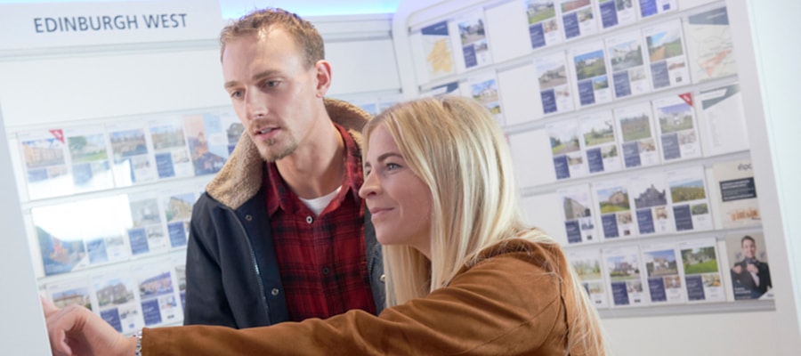 First time buyers browsing properties at the ESPC info centre