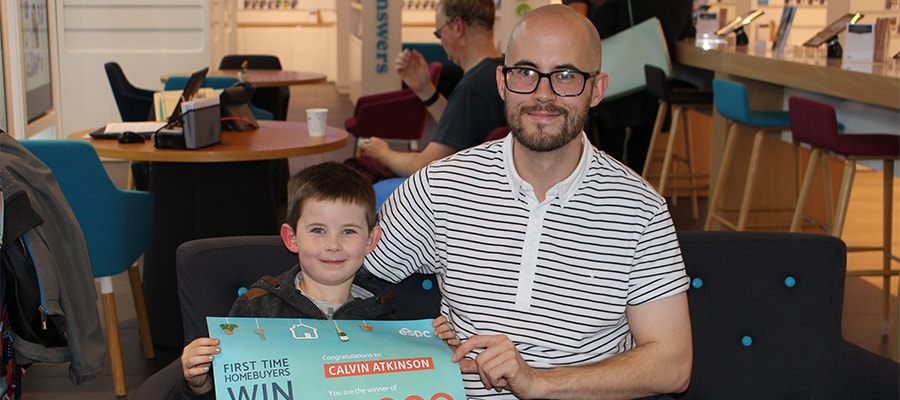 Calvin Atknson with his son at the ESPC Property Information Centre
